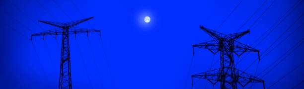 Electricity power lines over night sky