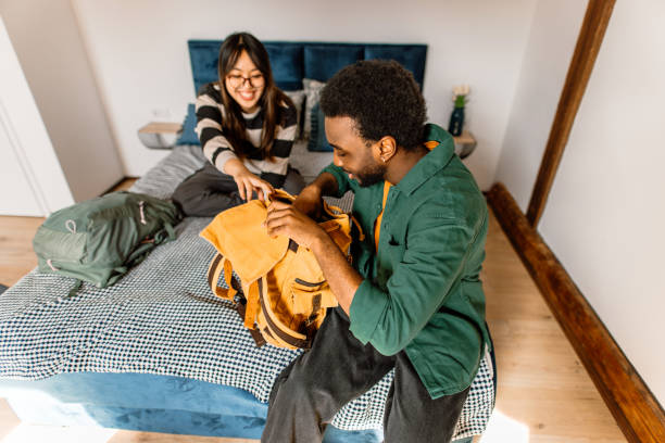 istock Tourists preparing backpacks for long city walk 2148636316