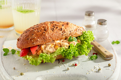 Healthy and homemade sandwich made of vegetables and chicken paste . Sandwich with vegetables and chicken paste.