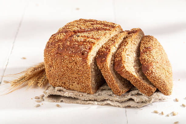 istock Healthy loaf of rye bread baked in a rustic kitchen. 2148637228