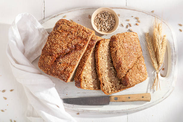 istock Square loaf of rye bread baked in home bakery. 2148637384