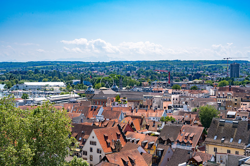 Description: View from the cathedral to the old town, the railway station, the Ferris wheel and the Säntis on a sunny summer day. Constance, Lake Constance, Baden Württemberg, Germany, Europe.