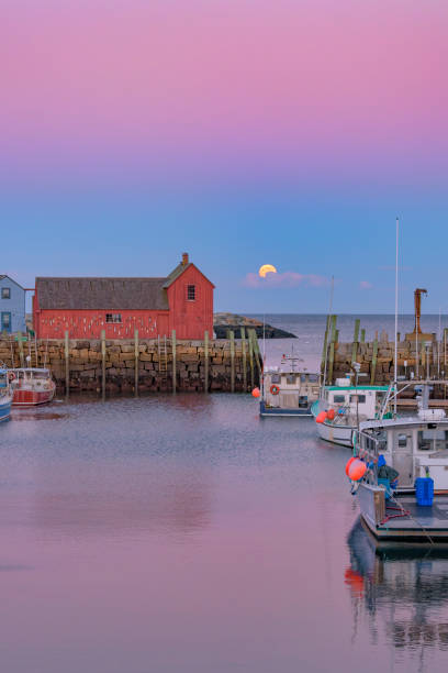 istock Full Beaver Moon Resting on a Cloud Next to Motif #1 Vertical 2148641604