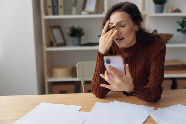 istock Upset unhappy suffering sad frustrated curly adorable woman doing facepalm touch forehead have serious financial problems bad relationships troubles at work worried about debt notification. Copy space 2148642142