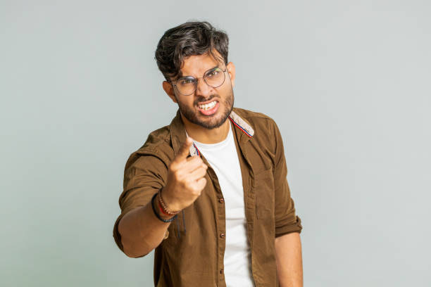 istock Irritated displeased aggressive unhappy Indian man gesturing hands blaming scolding failure problem 2148644148