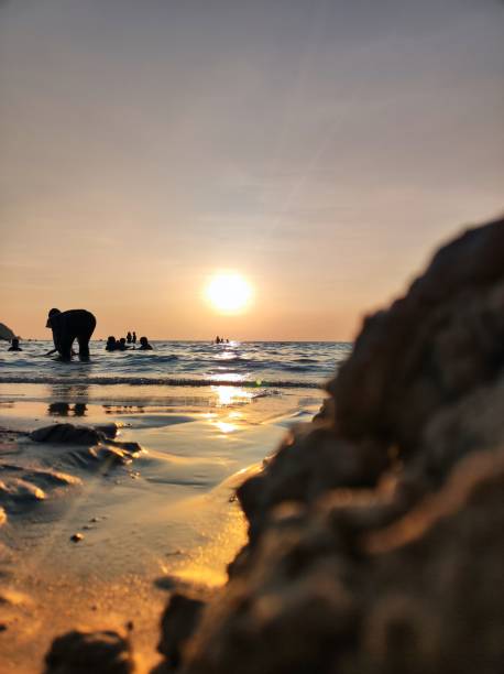istock Sunset by the sea 2148645455