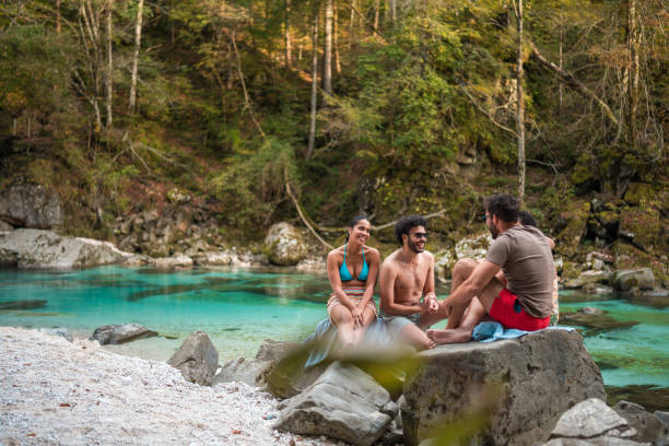 istock Cool Multi-Ethnic Friends Relaxing And Enjoying Summer In Nature 2148647752