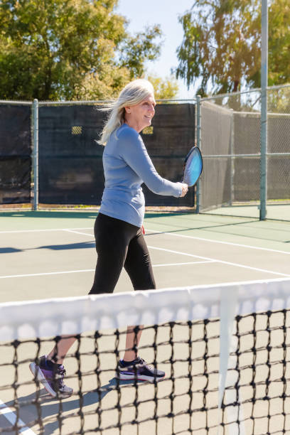 istock Senior women playing pickleball 2148649601