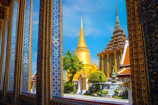 Bangkok, Thailand - September 16 2020: Wat Phra Kaew is a sacred temple and it's a part of the Thai grand palace, the Temple that houses an ancient Emerald Buddha