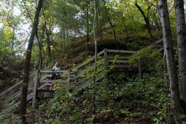 istock Starved Rock SP - St. Louis Canyon Trail - Pausing on the Stairs 2148653331