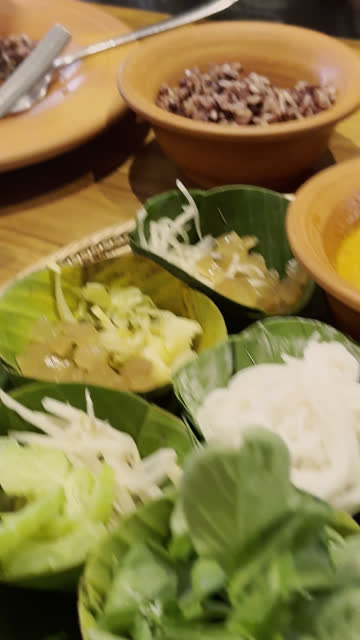 Eating Thai food in restaurant