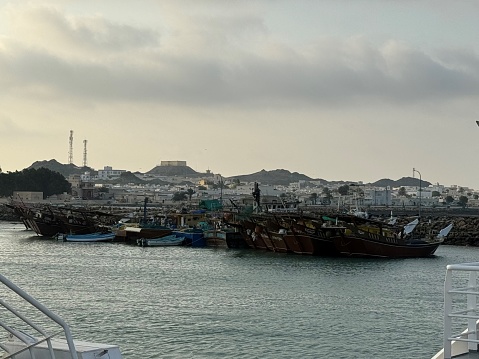 Different passengers and fishing boats in Masirah Island in Sultanate of Oman