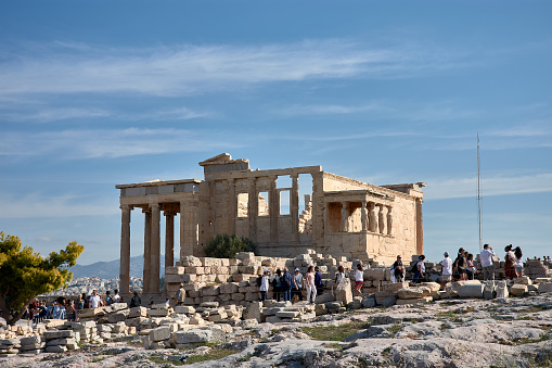 Athens, Greece; October,13,2022:Erectheion Temple with caryatid porch at Acropolis Athens Greece The famous Acropolis hill is a main landmark of Athens Ancient Greek ruins in the center of Athens Remains of ancient Athens
