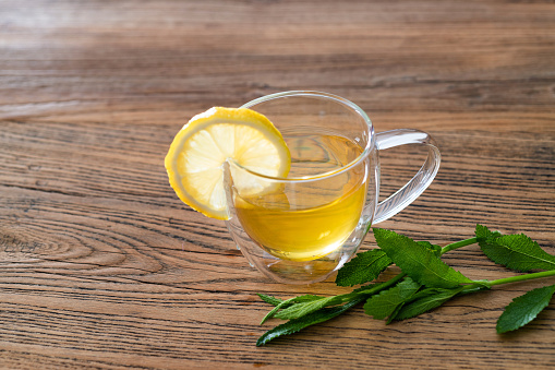 Water with verbena leaves and lemon
