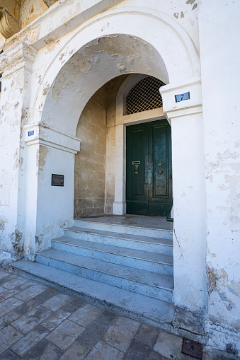 Valletta, Malta, April 03, 2024. The entrance of the headquarters of the United Grand Lodge of England, Sovereign Grand Lodge of Malta in the city center