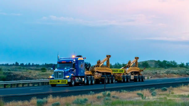 June 20, 2023\nRitzville, Washington USA\nAnderson Truck Service (ATS) towing an empty oversize windmill tower transport-trailer along an interstate highway.