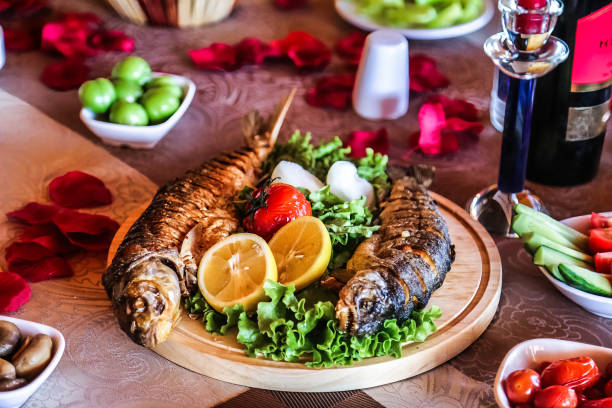 Platter of Fish and Vegetables on Table
