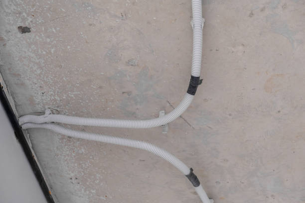 istock Apartment renovation. Electrical wiring. Wiring electrical cables on wall 2148664517