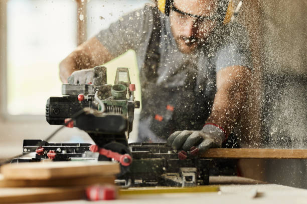 istock Cutting wood plank with electric saw! 2148665649