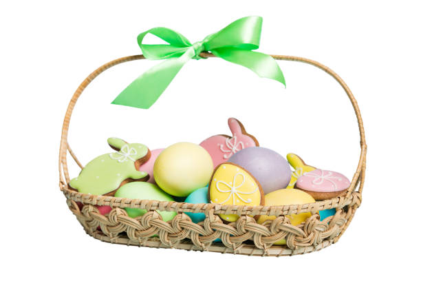 istock Colorful easter cookies in basket with Multi colors Easter eggs isolated on white background. Pastel color Easter eggs. holiday concept 2148665672