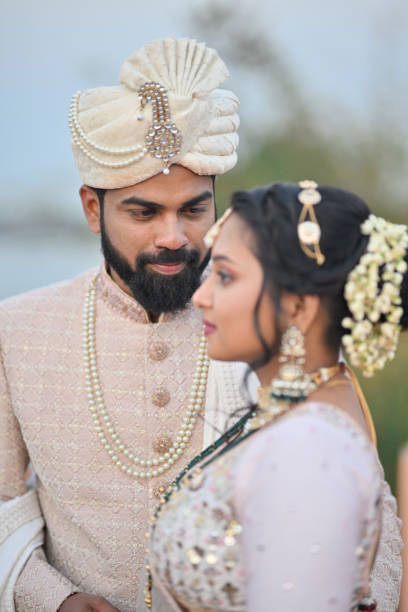 istock Groom lovingly gazing at Bride's face 2148666235