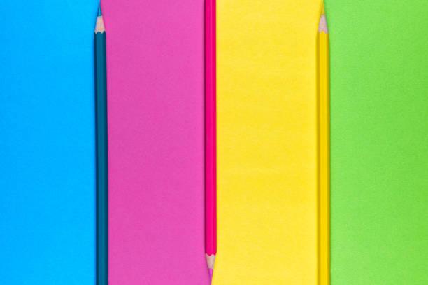 blank paper next to school tools with no word as a template for text space concept. business and education concept. pink background
