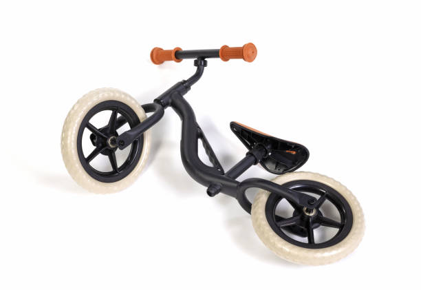 istock Used modern black balace bike for a small child, isolated 2148666357
