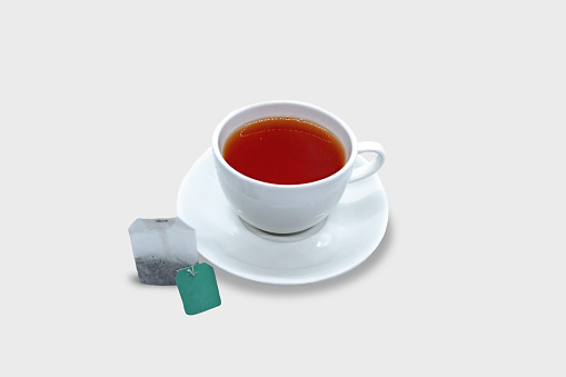 Subject: A cup of green tea on a white background