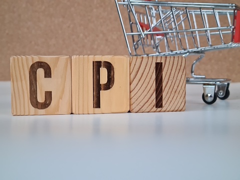 CPI, consumer price index concept. Wooden block with the words CPI