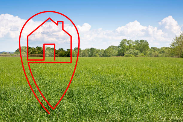 istock Land plot management and Real Estate concept with a vacant plot of land on a rural scene - Vacant plot available for building construction with home icon 2148669941