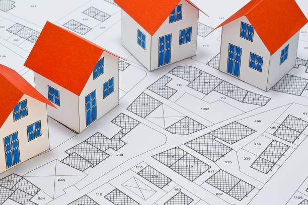 istock Cadastral map with buildings, building plot and free land parcel for house construction - building activity and permit concept with home model 2148671701
