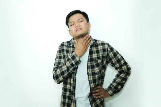 istock Young Asian man suffer sore throat 2148671705