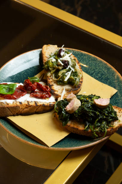 istock Grilled bread bruschetta with vegetables and cheese 2148672505