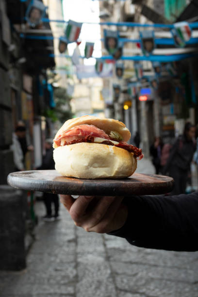 istock Sandwich with cheese and cold cuts on the street 2148672853