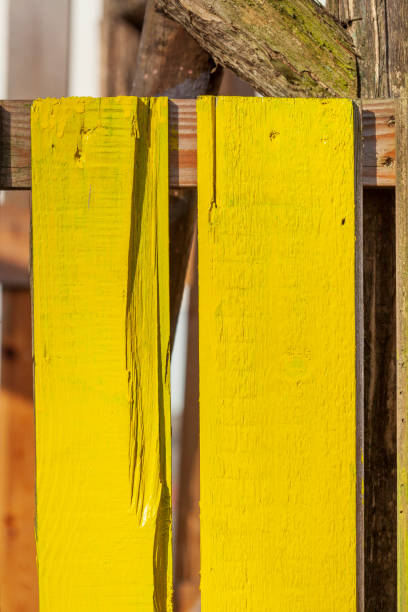 istock Yellow wooden board fence, Germany 2148672906