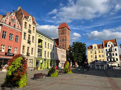 Torun, Poland 09.03.2023 - Torun, market square, historic old town, facade, sun, evening
