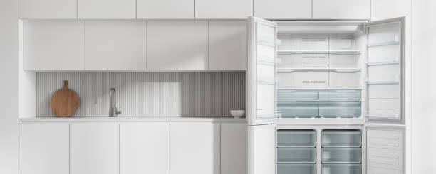 istock Luxury home kitchen interior with cooking cabinet and empty opened fridge 2148674040