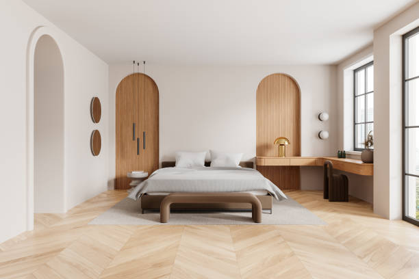 istock Beige home bedroom interior with bed, workplace and panoramic window 2148674513