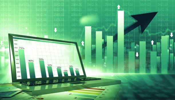 istock Laptop computer with stock market investment trading graph and candlestick 
chart 2148675544