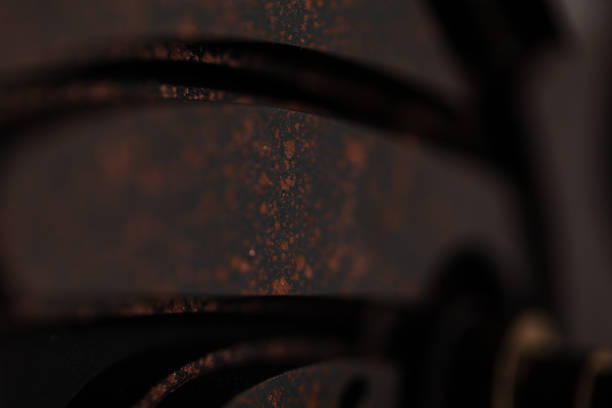 Dark background with texture and splashes of paint, close-up