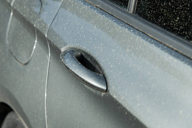 istock Sahara sand on the door handle of a grey car. 2148677399
