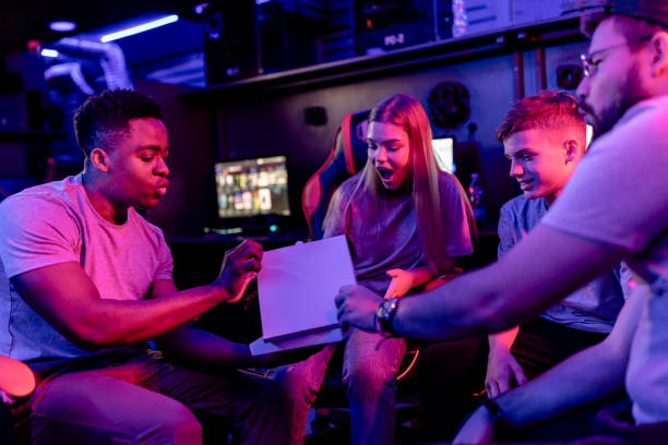 istock eSports team's joyful pizza break 2148677443