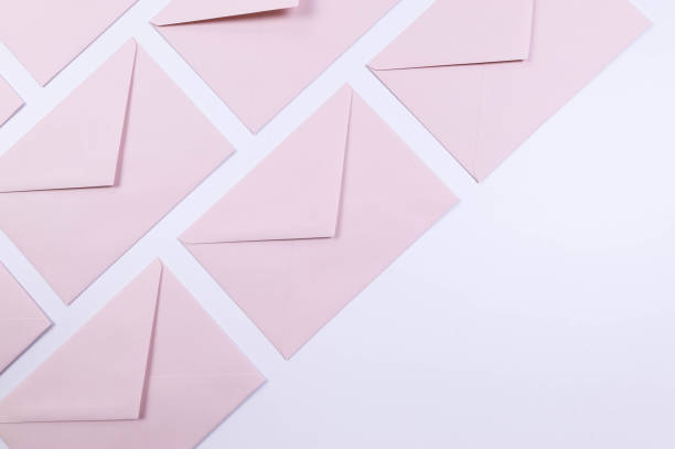 istock Top view of pink envelopes on white background. Post flat lay. 2148679230