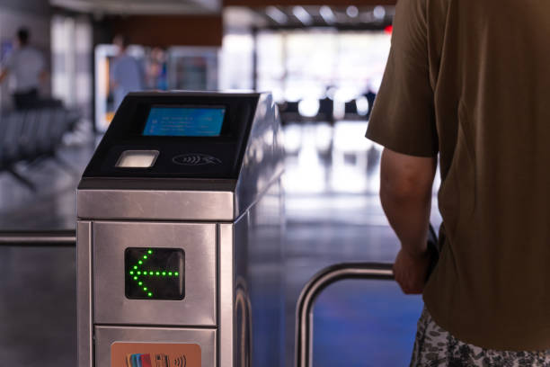 istock Turnstile is a close-up with a green arrow. Control and security. Pass through the passes. Turnstiles in the subway, on the piers. 2148680008