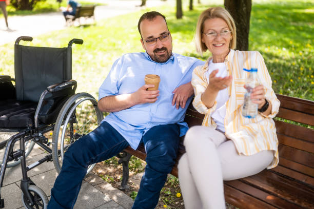 istock Paraplegic man with his mother 2148681725
