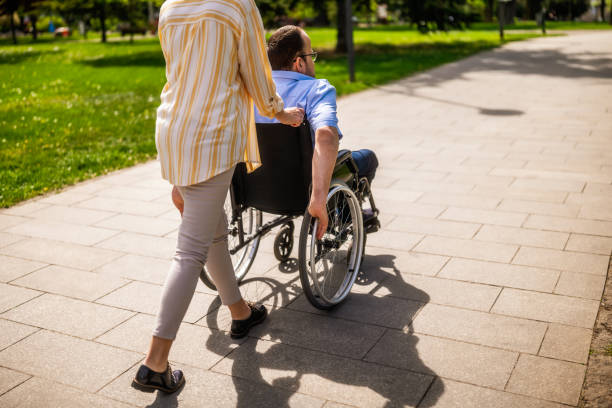 istock Paraplegic man with his mother 2148681792