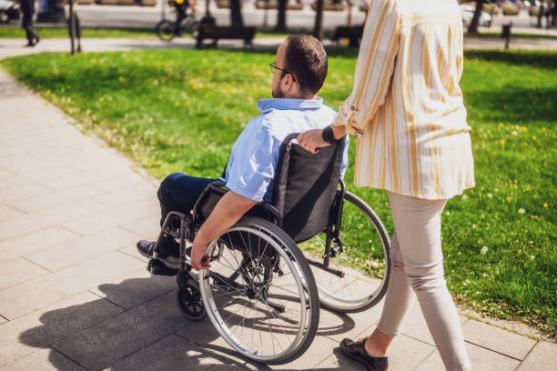 istock Paraplegic man with his mother 2148681813