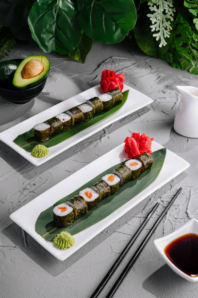 istock Delicious sushi platter on modern ceramic plates 2148682717