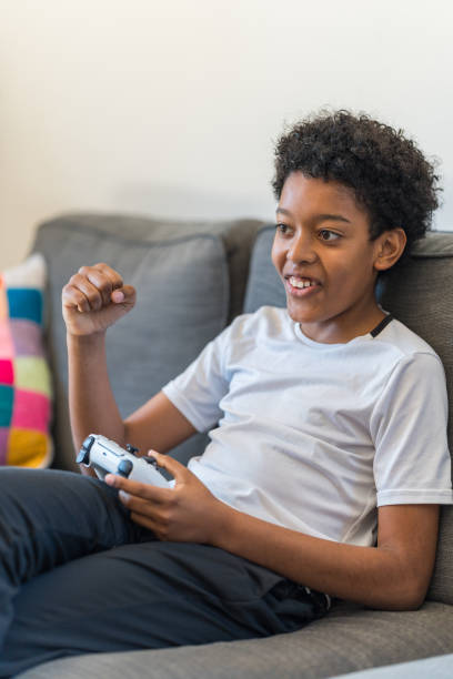 istock Player teenager boy playing video games 2148683888