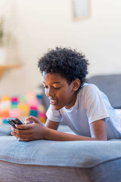 istock Close-up of a teenage boy using technology 2148683925